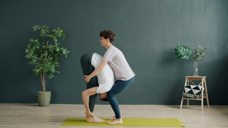 Two people training together at home
